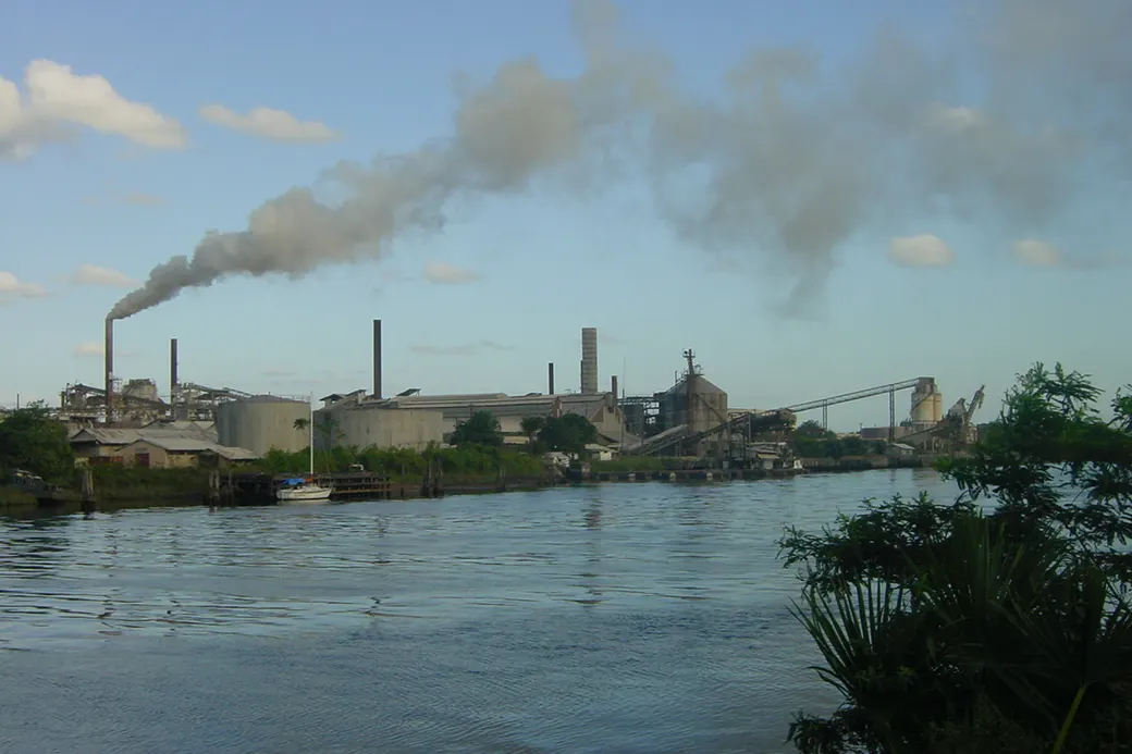 Photo of the Demerara River in Linden, with the bauxite plant on the bank